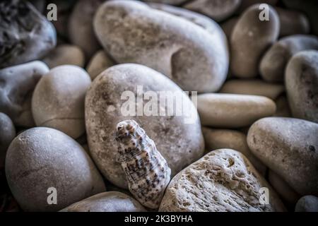 White pebble stones on the beach of Myrtos Stock Photo