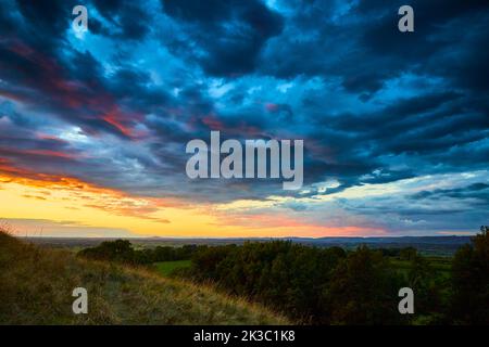 Dramatic clouds and sunset from Glastonbury Tor, Somerset Stock Photo