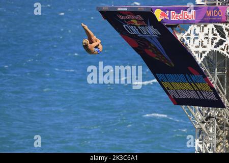 Polignano a Mare, Italy, September 18, 2022.  Red Bull Cliff Diving, jumping in before the fourth and final round at this year's competition. Stock Photo