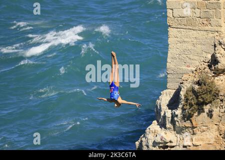 Polignano a Mare, Italy, September 18, 2022.  Red Bull Cliff Diving, jumping in before the fourth and final round at this year's competition. Stock Photo