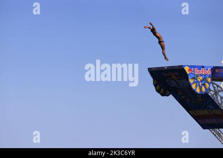 Polignano a Mare, Italy, September 18, 2022.  Red Bull Cliff Diving, jumping in before the fourth and final round at this year's competition. Stock Photo