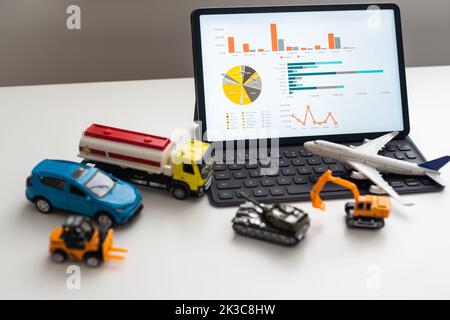 Tablet computer with different types of toy transport. auto center Stock Photo