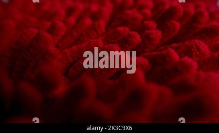 Red fluffy texture, Close up detailed furry yarn, copy space, macro photography Stock Photo
