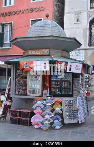 Venice,Italy- kiosk full of various newspapers on a small street in Venice Stock Photo
