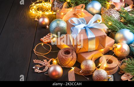 Christmas composition with gifts and Christmas decorations on a dark background. the concept of Christmas, new year. Stock Photo