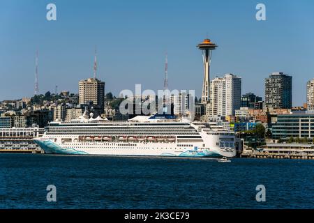 Norwegian Spirit cruise ship by Norwegian Cruise Line with Space Needle in the background, Seattle, Washington, USA Stock Photo