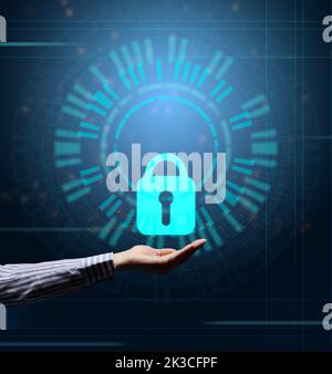 Virtual screen with padlock and hand. The concept of protecting personal information on the network. Cybersecurity and Internet technologies Stock Photo