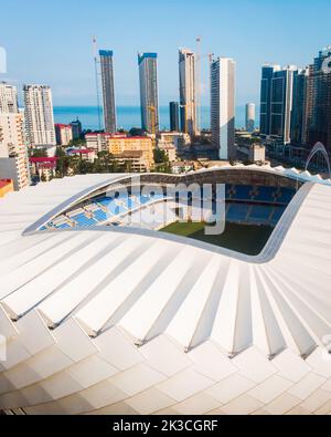 Batumi, Georgia - 4th august, 2022 : Aerial overview Football club FC Dinamo Batumi stadium ( Adjarabet arena ). Modern architecture buildings and foo Stock Photo