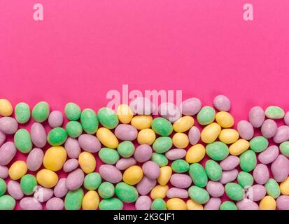 Colorful lollipops on a pink background Stock Photo