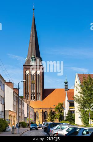 Stargard, Poland - August 11, 2022: XV century St. John the Baptist gothic church in historic old town quarter of Stargard Stock Photo