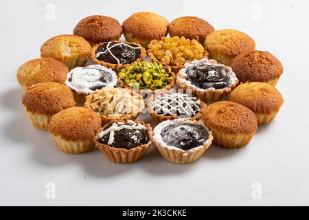 Group off muffin cake isolated on white background Stock Photo