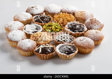 Group off muffin cake isolated on white background Stock Photo