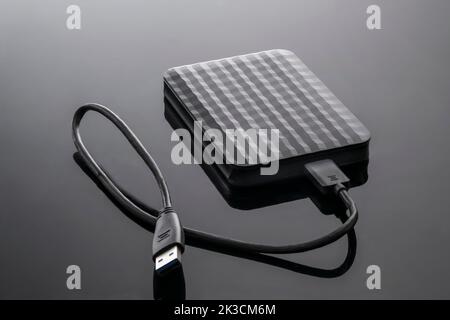 external hard disk drive memory for computer on a black background close-up. Stock Photo