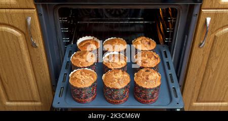 Baked Easter cakes in the oven. Spring Easter Feast Stock Photo