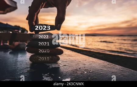 Happy new year 2023 replace old 2022. New Year 2023 is coming concept idea. High resolution creative photo image for web banners, social media posts. Stock Photo