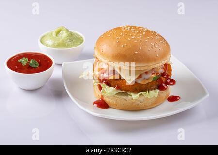Fresh tasty burger isolated on white background. Stock Photo