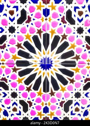 traditional Uzbek pattern on ceramic tile on wall of mosque Seamless old floral pattern Abstract background. Stock Photo