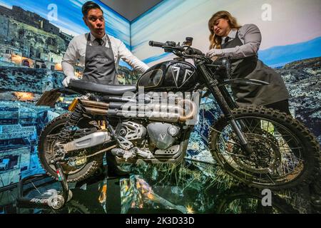 London, UK. 26 Sep 2022. No Time To Die (2021), Triumph Scrambler 1200 XE, (estimate: £20,000-30,000) - To mark the 60th anniversary of the James Bond films, Christie's and EON Productions are holding a charity sale, Sixty Years of James Bond including a total of 60 lots. The live sale (28th Sept) comprises vehicles, watches, costumes and props associated with the 25th film No Time To Die six lots offered celebrating each of the six James Bonds. Credit: Guy Bell/Alamy Live News Stock Photo