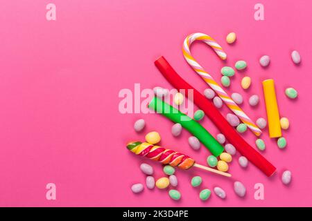 Colorful lollipops on a pink background Stock Photo