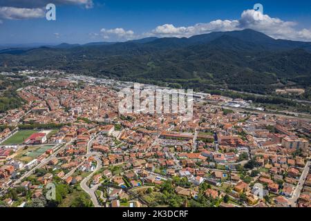Aerial view of the city of Sant Celoni. In the background, the Montnegre mountain (Vallès Oriental, Barcelona, Catalonia, Spain) Stock Photo
