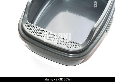 Gray toilet tray for cats on a white background Stock Photo