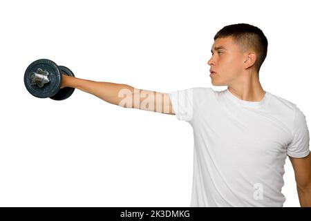 19 year old teenage boy lifting dumbbells Stock Photo