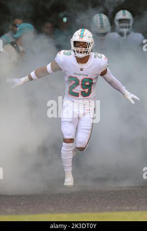 Miami Dolphins safety Brandon Jones (29) grabs Buffalo Bills running back  James Cook (28) during the