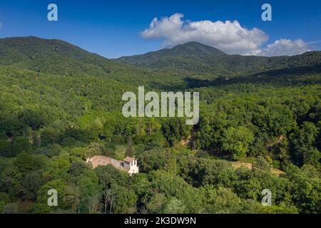 Aerial view of the Olzinelles valley in the Montnegre-Corredor natural park. In the foreground, the rectory of Olzinelles (Barcelona, Spain) Stock Photo