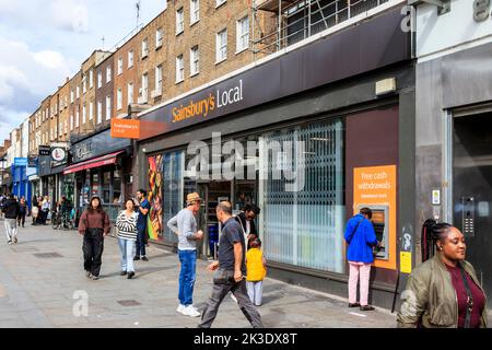 A branch of  Sainsbury's Local in Camden High Street, London, UK Stock Photo