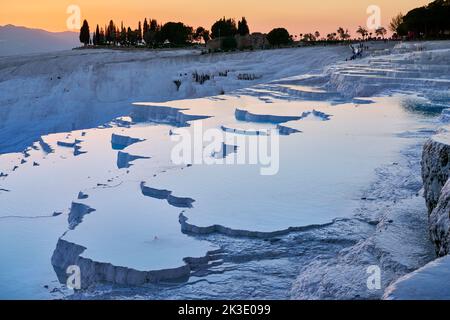 sunset behind Pamukkale travertine terraces, Denizli, Turkey Stock Photo