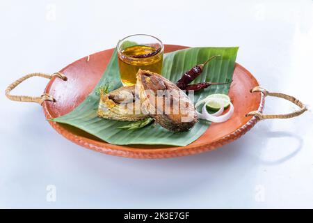 ilish panta Bengali new year festive dish. Boishakh panta ilish with green chilli and onion. Panta bhat is popular among Bengali's in India and Bangla Stock Photo