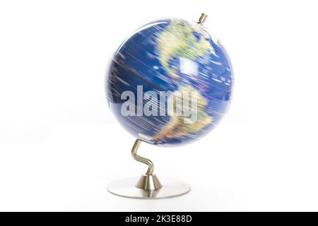 Globe of the world spinning isolated on white background Stock Photo