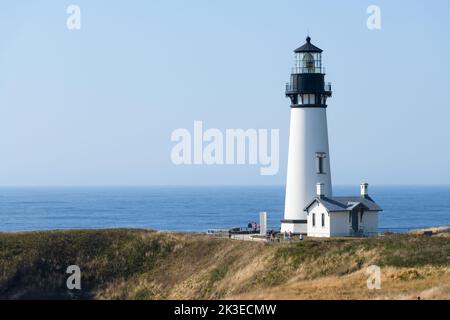 Newport, OR, USA - September 19, 2022; Black and white painted Yaquina lighthouse at the Outstanding Natural Area Stock Photo
