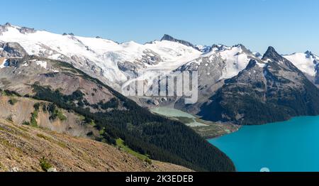 Expansive mountain vista with Garibaldi Lake from Panorama Ridge. Stock Photo