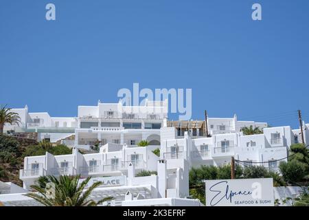 Ios, Greece - September 11, 2022 : View of a luxury whitewashed hotel with balcony’s in Ios Greece Stock Photo