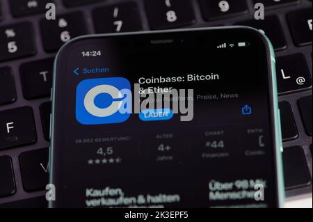 blue coinbase app icon on a smartphone screen Stock Photo
