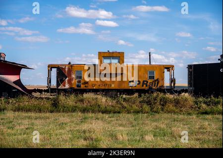 Mossleigh, Alberta - September 17, 2022: old abandoned rail cars on a railway in rural Alberta. Stock Photo