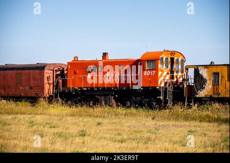 Mossleigh, Alberta - September 17, 2022: old abandoned rail cars on a railway in rural Alberta. Stock Photo