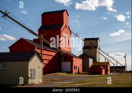 Mossleigh, Alberta - September 17, 2022: Old wooden grain elevators on the Alberta prairies. Stock Photo