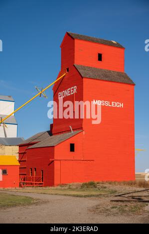 Mossleigh, Alberta - September 17, 2022: Old wooden grain elevators on the Alberta prairies. Stock Photo