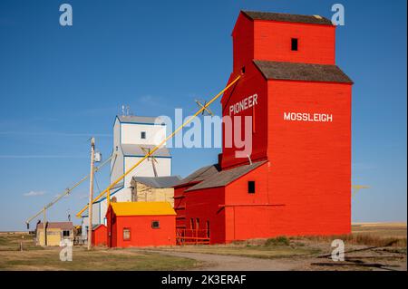 Mossleigh, Alberta - September 17, 2022: Old wooden grain elevators on the Alberta prairies. Stock Photo