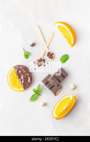 Making candied orange slices dipped in dark chocolate flatlay Stock Photo