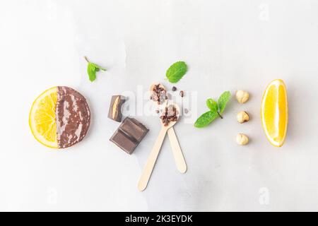 Making candied orange slices dipped in dark chocolate flatlay Stock Photo