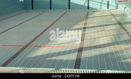 Abandoned swimming pool. An empty swimming pool is under construction.  Stock Photo