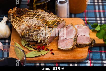 Pork baked in oven in large piece Stock Photo