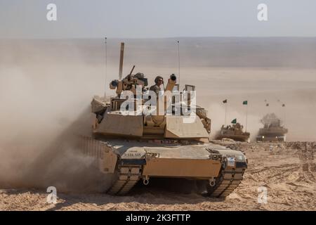 U.S. Army Soldiers from the 1st Combined Arms Battalion, 163rd Cavalry Regiment and Royal Saudi Land Forces, conduct armored assault movements with their M1 Abrams tank during Exercise Eager Lion in Jordan, Sept. 11, 2022. Eager Lion 22 is a multilateral exercise hosted by the Hashemite Kingdom of Jordan, designed to exchange military expertise, and improve interoperability among partner nations. (U.S. Army photo by Sgt. Nicholas Ramshaw) Stock Photo