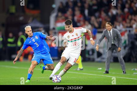 Budapest, Hungary, September 26, 2022. BUDAPEST, HUNGARY - SEPTEMBER 26: Federico Dimarco and Dominik Szoboszlai of in action during the UEFA Nations League League A Group 3 match between Hungary and Italy at Puskas Arena on September 26, 2022 in Budapest, Hungary. Stock Photo