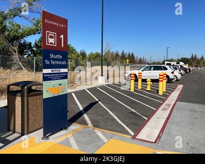 Economy Lot 1, shuttle to terminal sign at Norman Y. Mineta San Jose SJC International Airport - San Diego, California, USA - 2022 Stock Photo