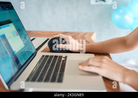 woman hand using computer ergonomic mouse, prevention wrist pain because working long time. De Quervain s tenosynovitis, Intersection Symptom, Carpal Stock Photo