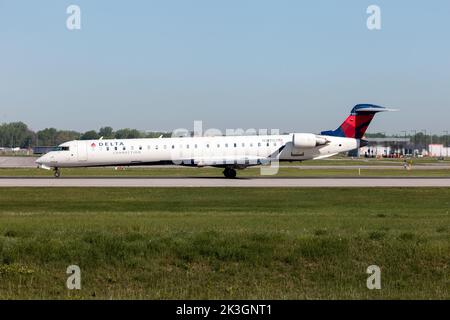 A Delta Connection (Endeavor Air) Bombardier CRJ-900LR in Montreal Pierre Elliott Trudeau International Airport. Endeavor Air is an American regional airline that operates as Delta Connection for Delta Air Lines. The airline was founded as Express Airlines I in 1985 and was renamed Pinnacle Airlines in 2002 Stock Photo